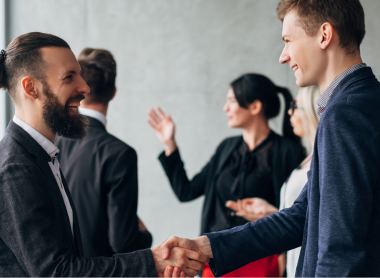 Delegates networking at a conference