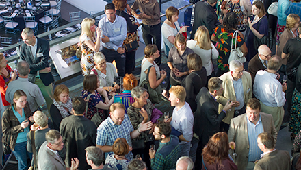 Delegates networking at a conference